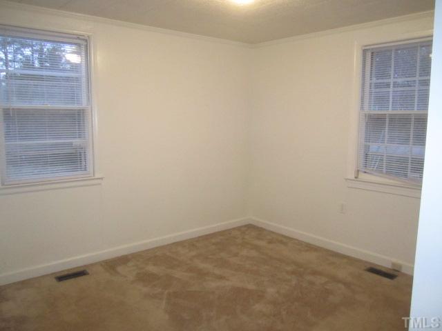 2305 Andor Place Raleigh, NC 27604 - Photo 7 of 9 an empty room with a window