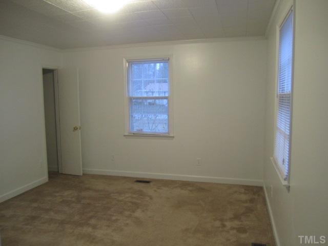 2305 Andor Place Raleigh, NC 27604 - Photo 8 of 9 an empty room with a window