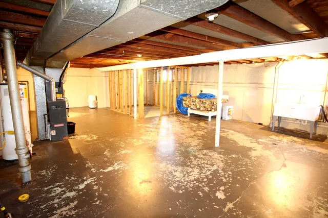 a view of a patio with table and chairs next to a yard