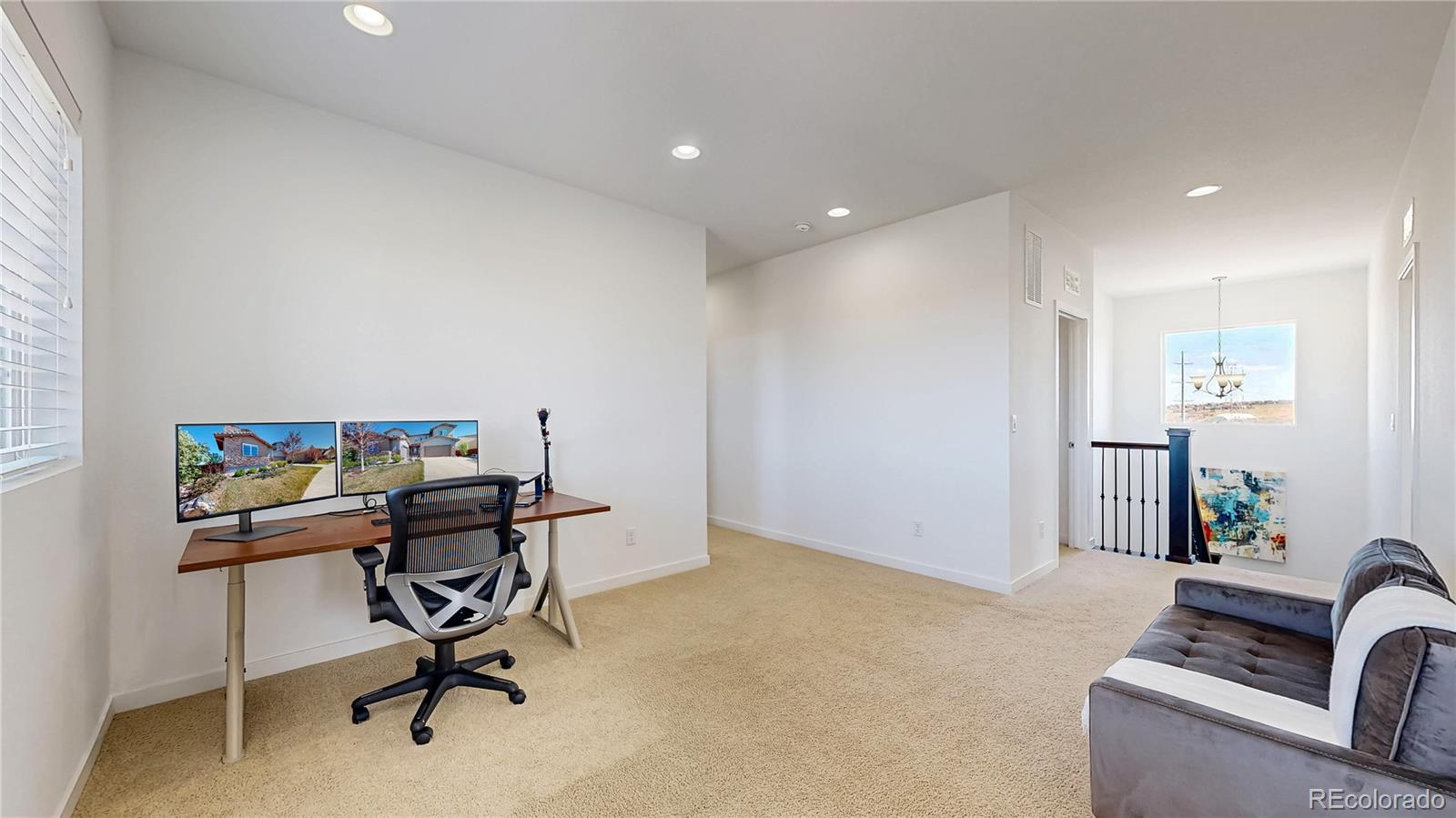 13950 Box Turtle Loop Parker, CO 80134 - Photo 24 of 48 a view of a workspace with furniture