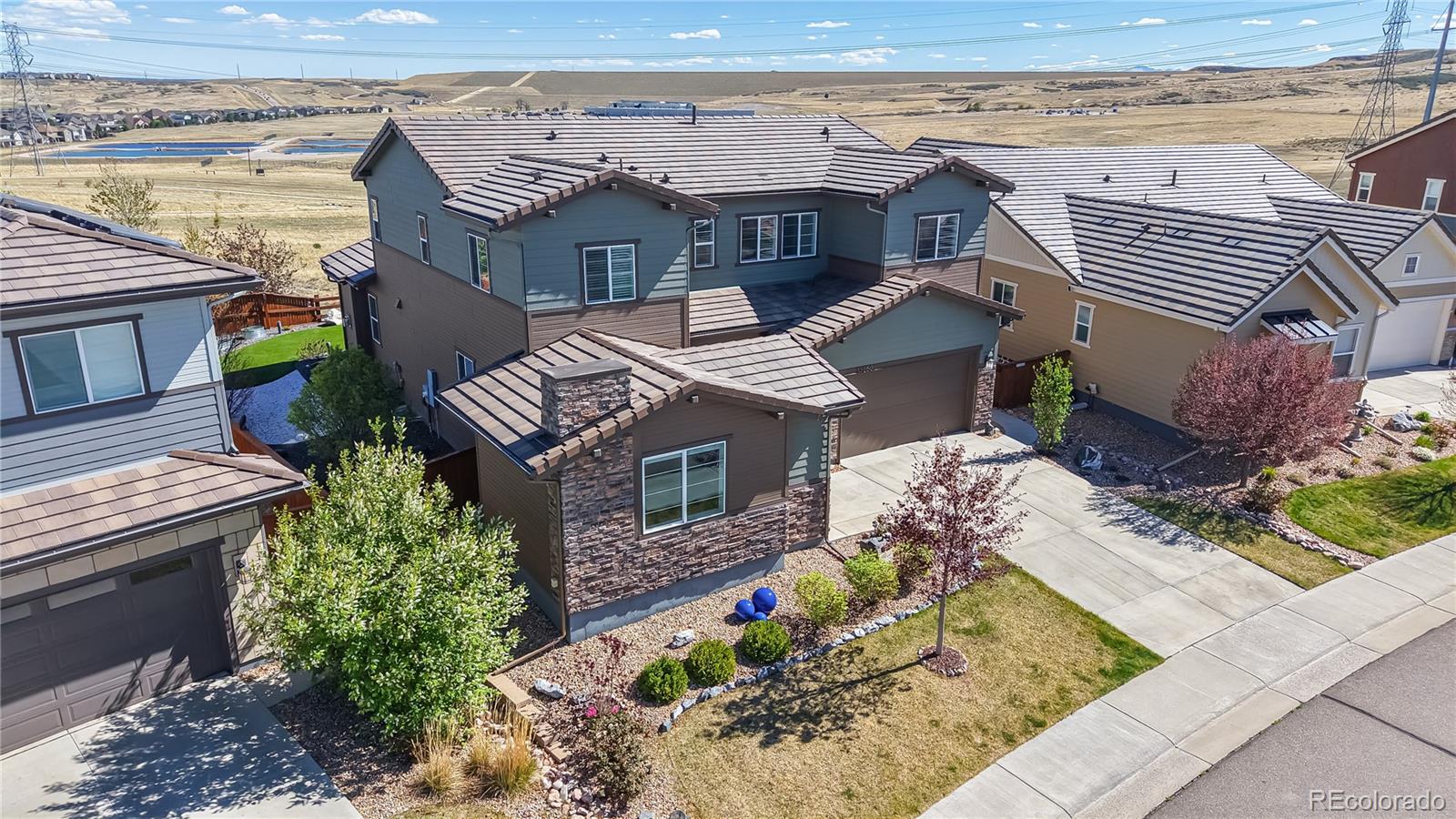 13950 Box Turtle Loop Parker, CO 80134 - Photo 27 of 48 an aerial view of a house with a ocean view