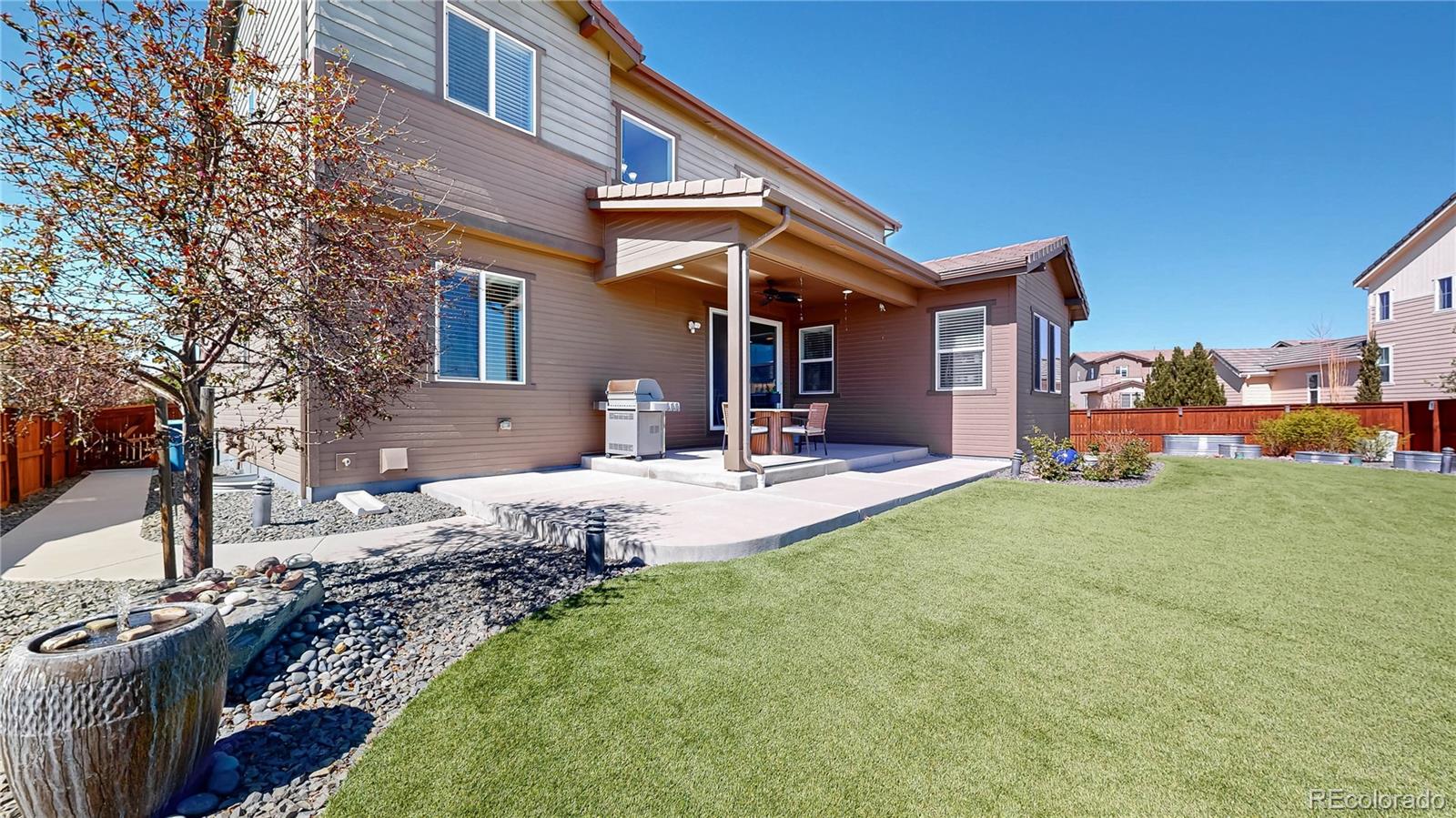 13950 Box Turtle Loop Parker, CO 80134 - Photo 28 of 48 a front view of a house with a yard