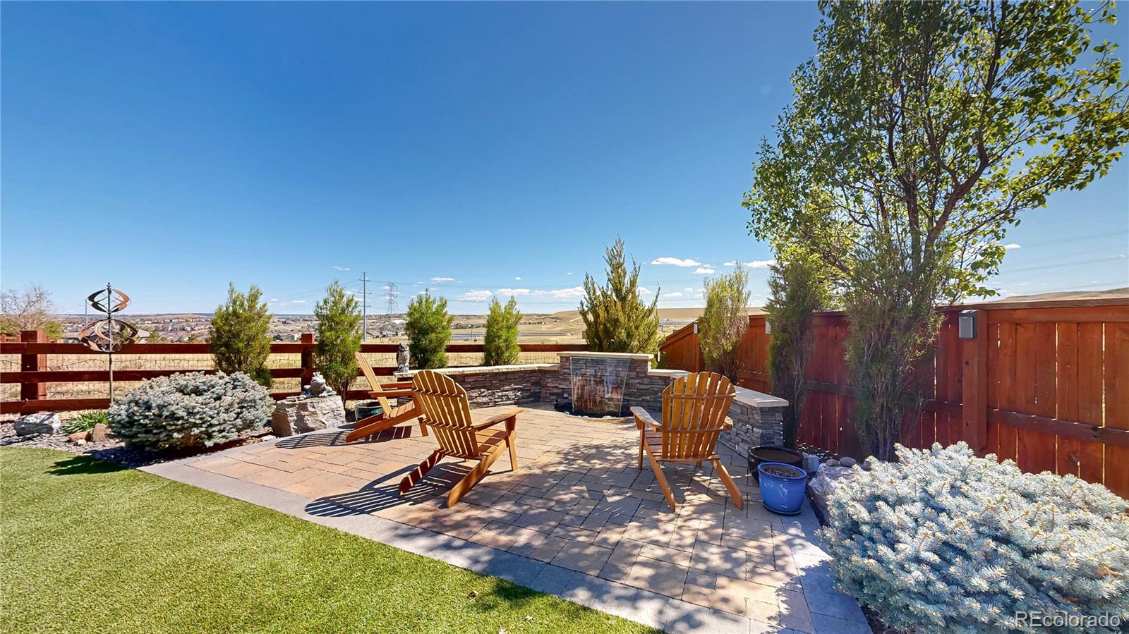 13950 Box Turtle Loop Parker, CO 80134 - Photo 33 of 48 a view of a backyard with sitting area