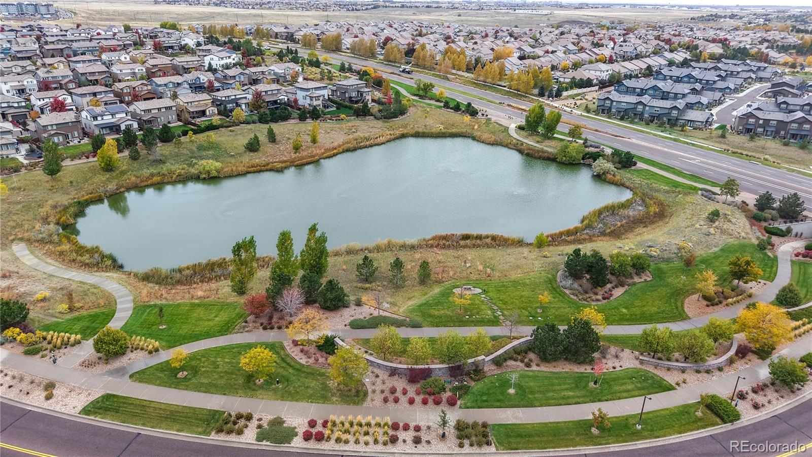 13950 Box Turtle Loop Parker, CO 80134 - Photo 40 of 48 an aerial view of residential houses with outdoor space