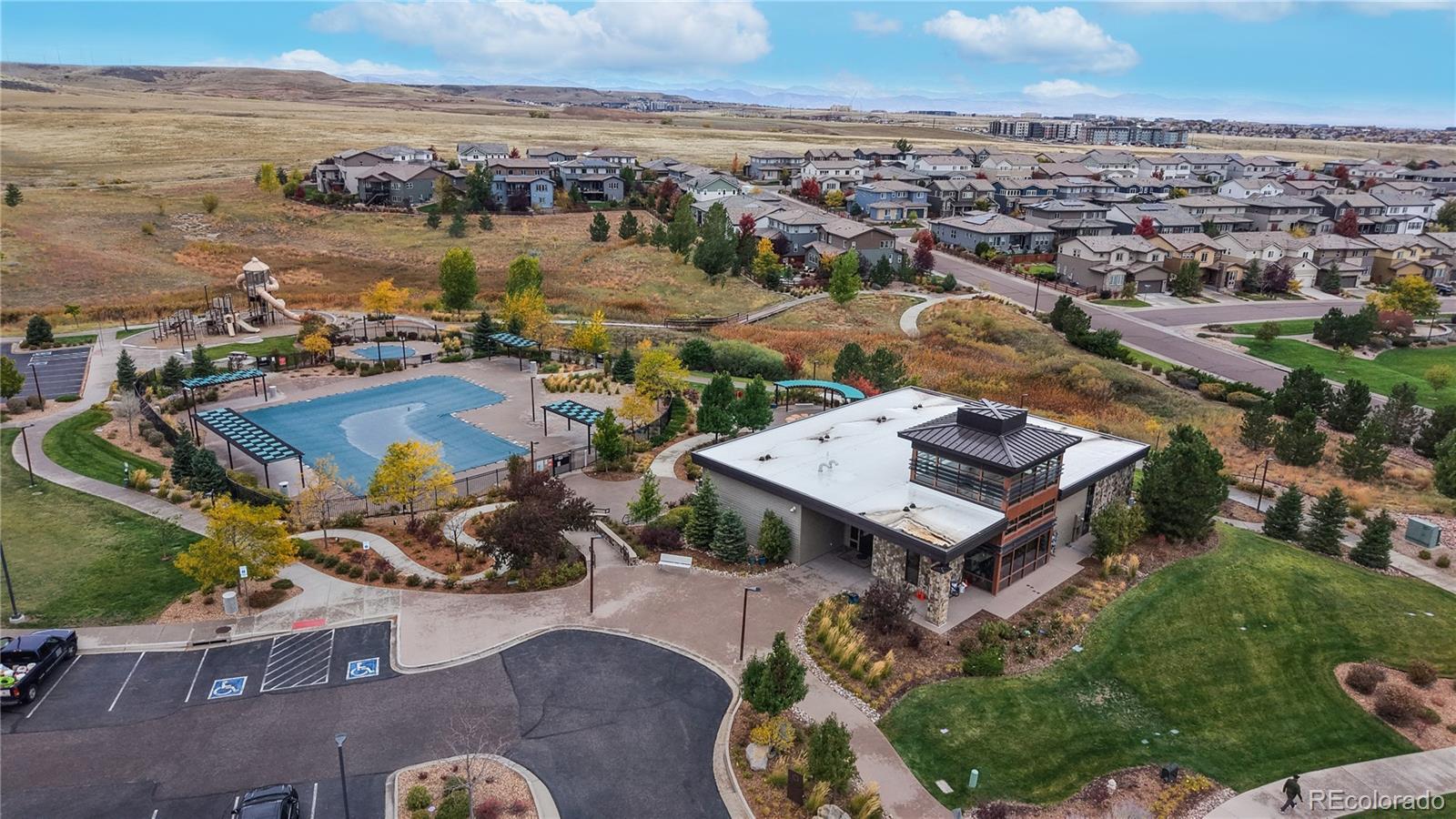 13950 Box Turtle Loop Parker, CO 80134 - Photo 4 of 48 an aerial view of a house with outdoor space