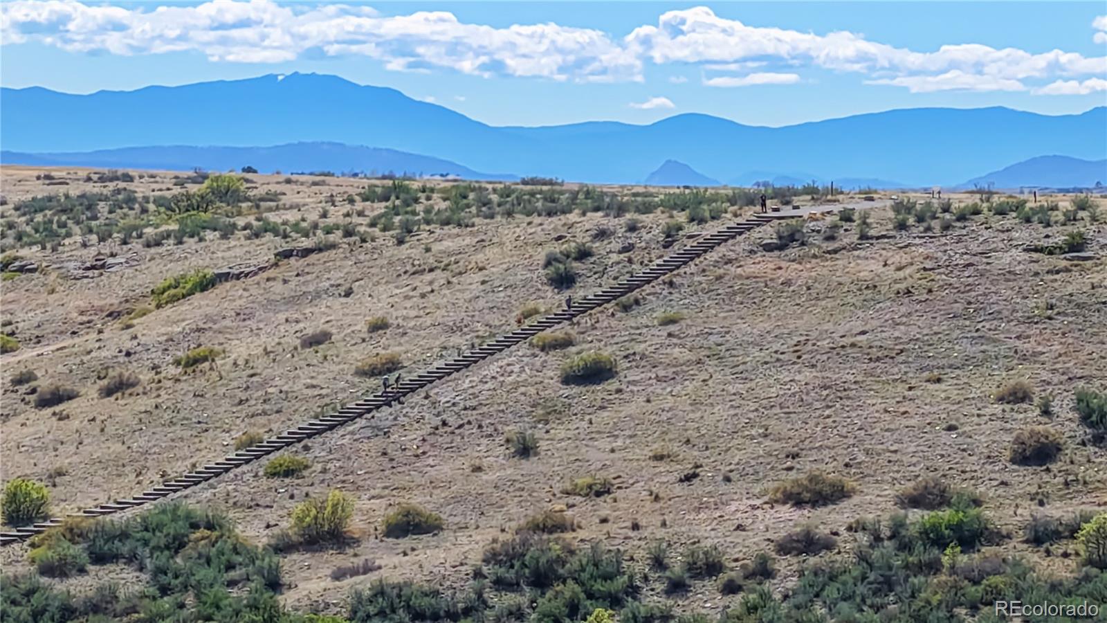 13950 Box Turtle Loop Parker, CO 80134 - Photo 45 of 48 a view of an ocean beach and mountain
