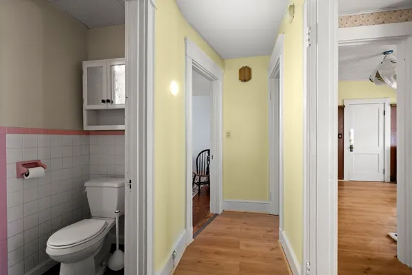 a bathroom with a toilet and a sink