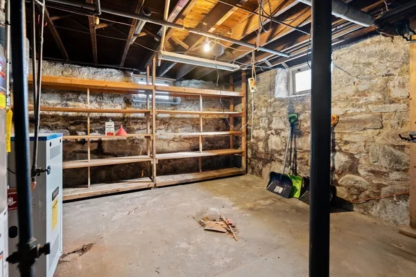 a view of a room with wooden walls