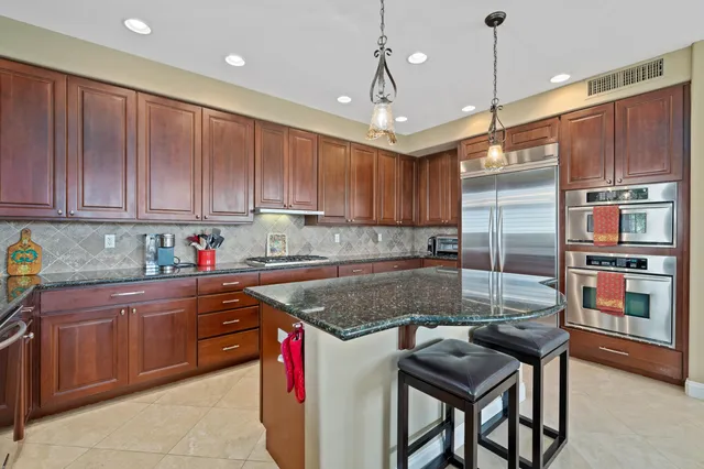 a bed room with a bed window and a television