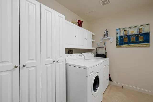 a view of a city with mountains in the background