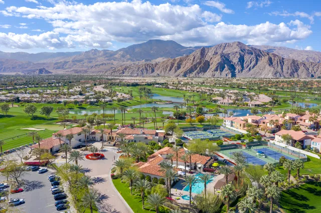 a view of a city with a lake