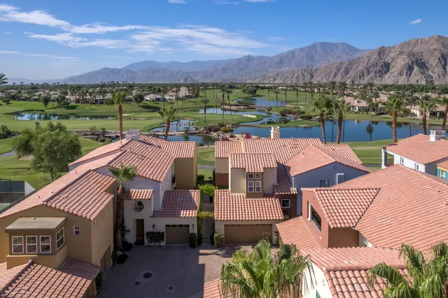 a view of a lake with boats and water view