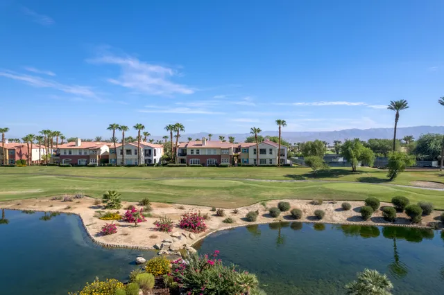 a view of a pathway both side of the house