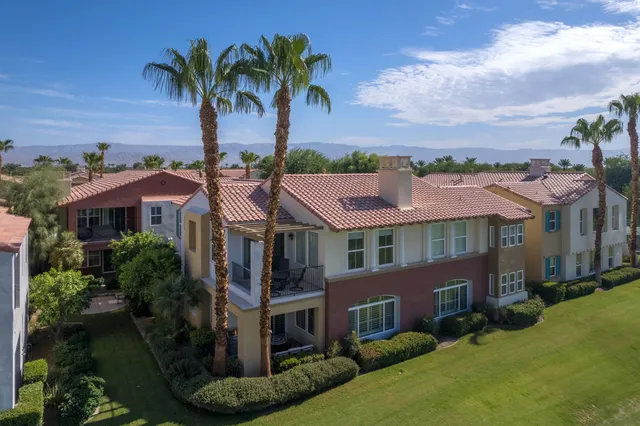 a view of a golf course with a big yard