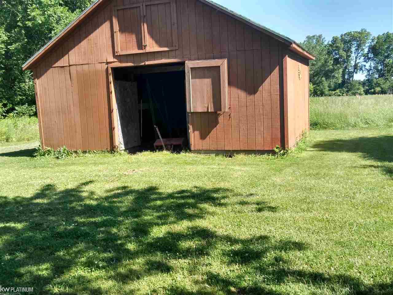 9242 Webb Road Goodells, MI 48027 - Photo 23 of 68 Horse Barn