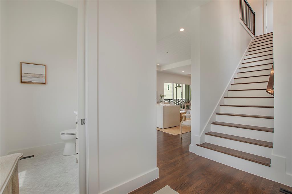 1031 Mobile Street Dallas, TX 75208 - Photo 13 of 28 a view of entryway with wooden floor and stairs