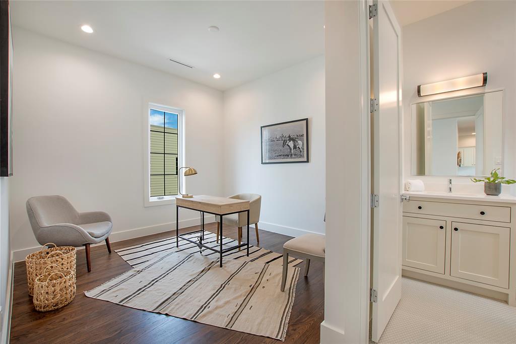 1031 Mobile Street Dallas, TX 75208 - Photo 18 of 28 a view of a livingroom with furniture and a table in it