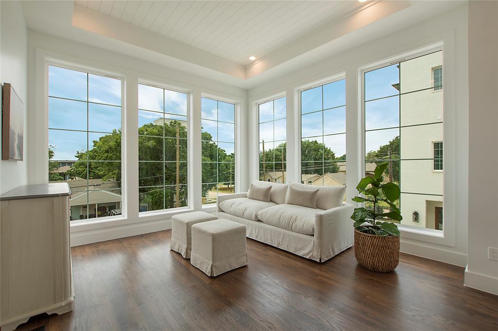 1031 Mobile Street Dallas, TX 75208 - Photo 10 of 28 a living room with furniture and a large window with outer view