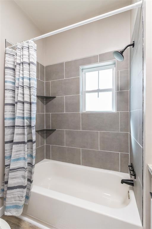 601 North Ave G Haskell, TX 79521 - Photo 29 of 36 a bathroom with a bathtub and shower