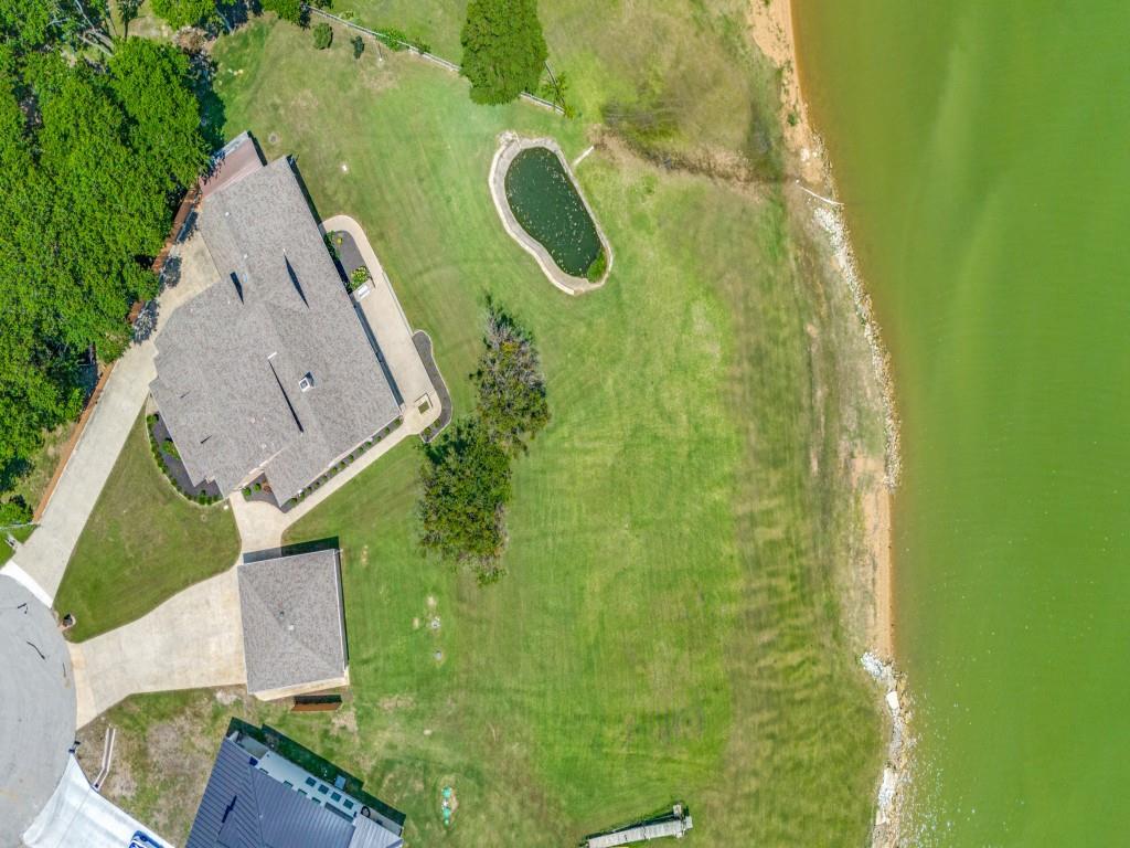 5975 Diamond Spur Frisco, TX 75036 - Photo 39 of 40 an aerial view of a house with a yard and trees