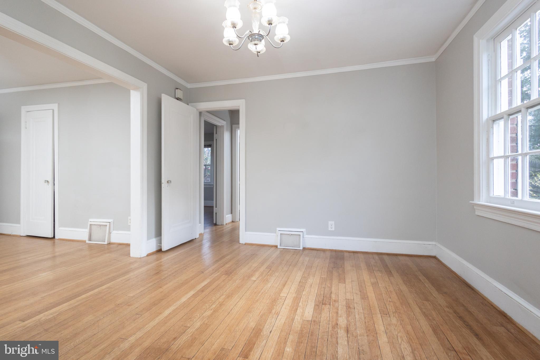 312 North Highland Street Arlington, VA 22201 - Photo 19 of 33 wooden floor in an empty room with a window
