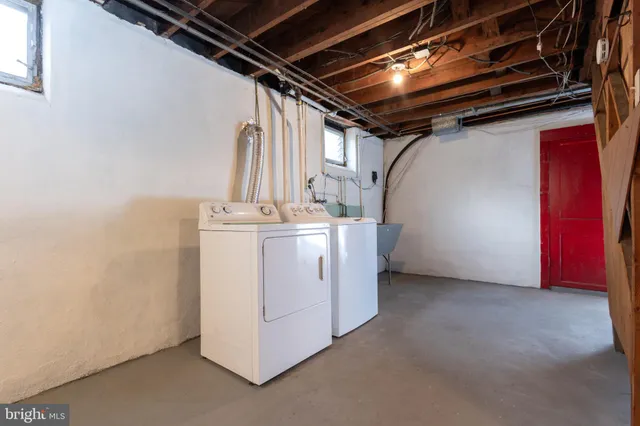 a utility room with dryer and washer