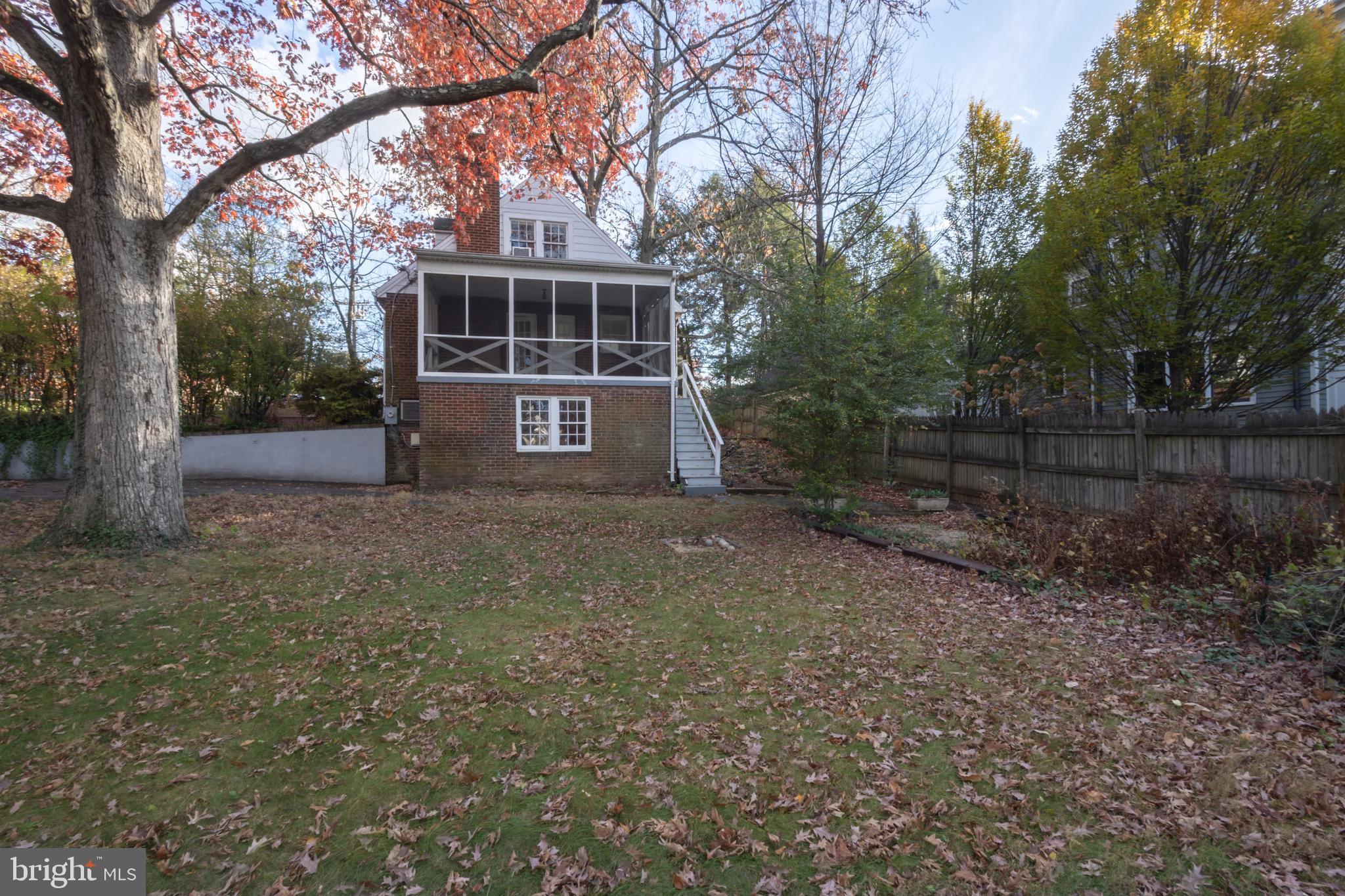 312 North Highland Street Arlington, VA 22201 - Photo 3 of 33 a view of house with outdoor space and garden