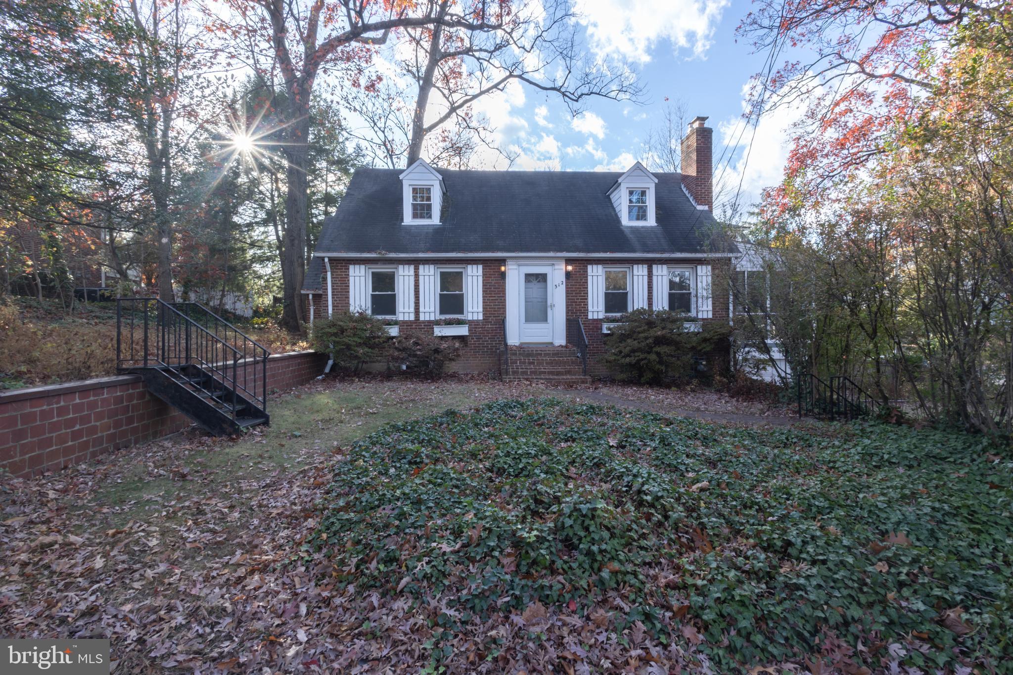 312 North Highland Street Arlington, VA 22201 - Photo 32 of 33 a house that has a lot of plants and trees in it