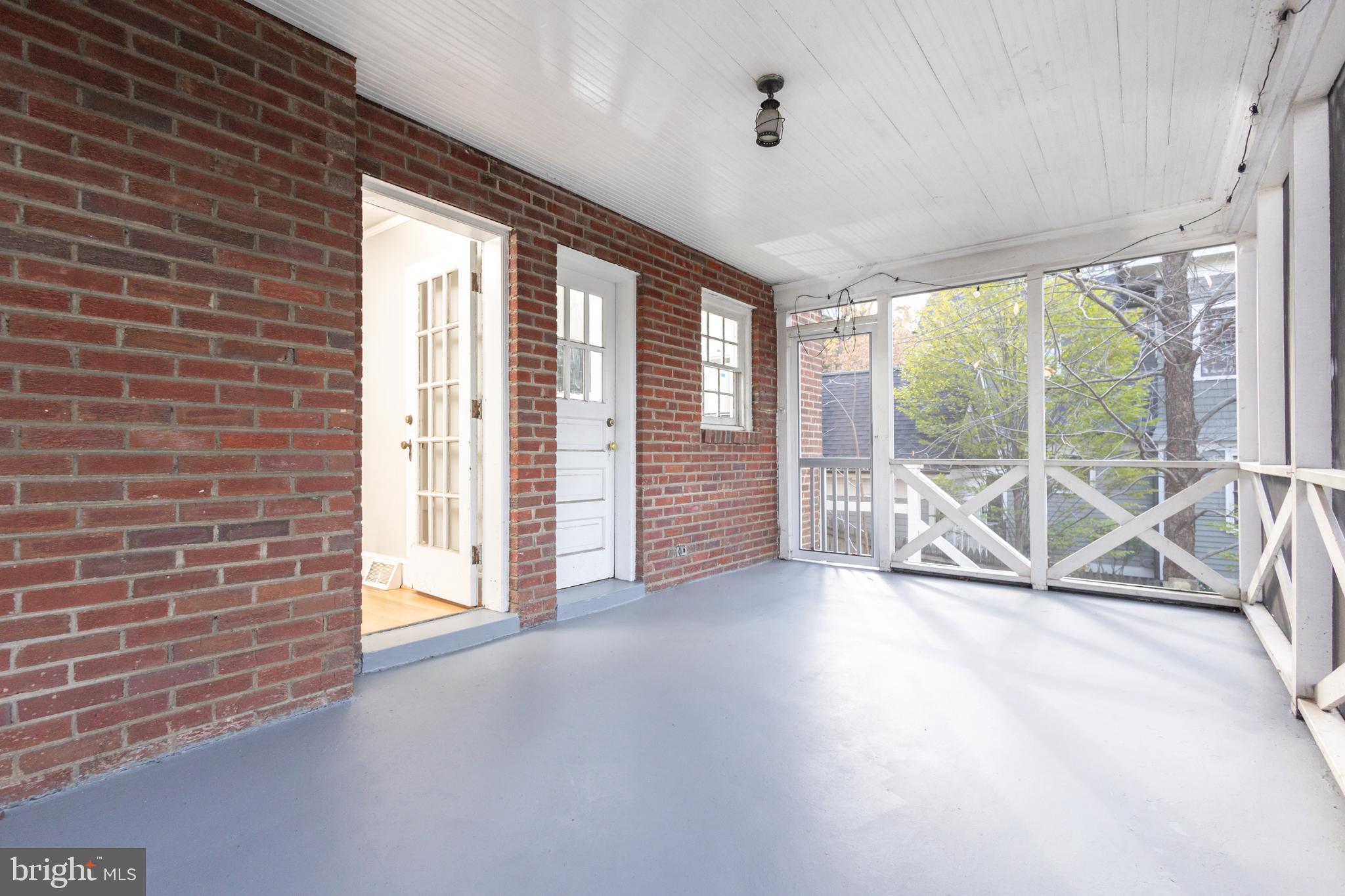 312 North Highland Street Arlington, VA 22201 - Photo 9 of 33 a view of an empty room with a balcony