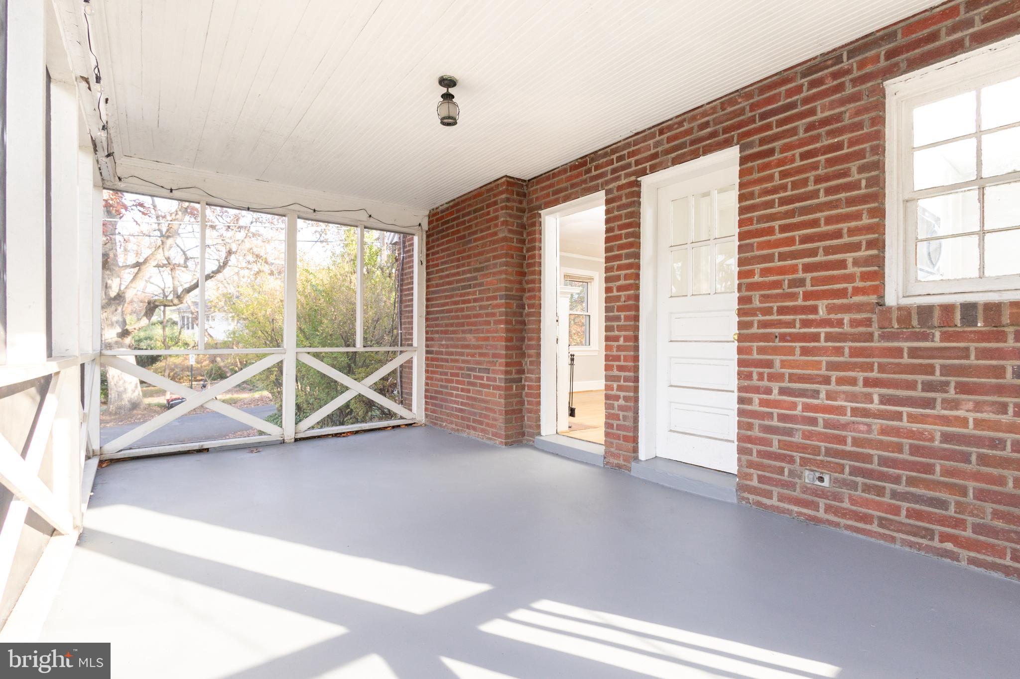 312 North Highland Street Arlington, VA 22201 - Photo 10 of 33 a view of a livingroom with wooden floor and windows