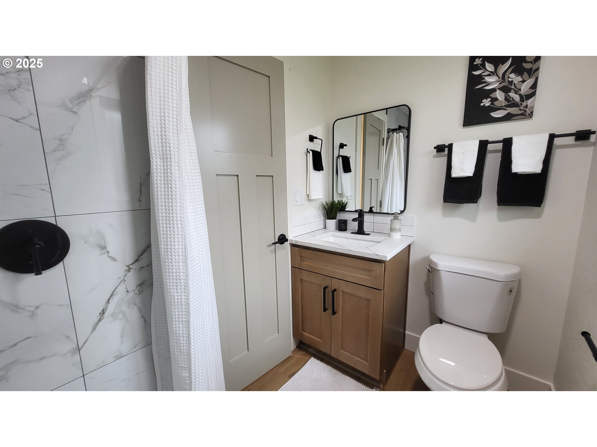 2240 Providence Street Eugene, OR 97401 - Photo 12 of 28 a bathroom with a toilet sink shower and mirror