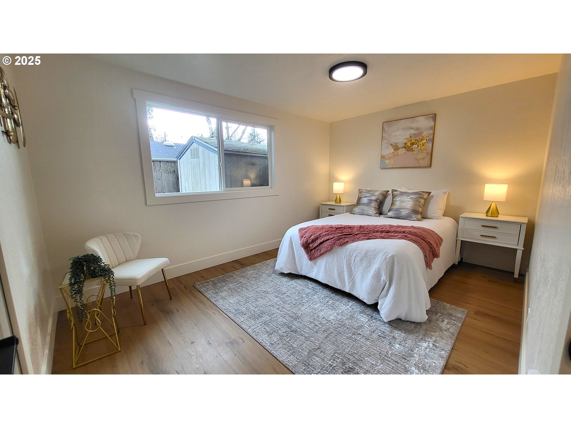 2240 Providence Street Eugene, OR 97401 - Photo 20 of 28 a living room with a bed furniture and a window