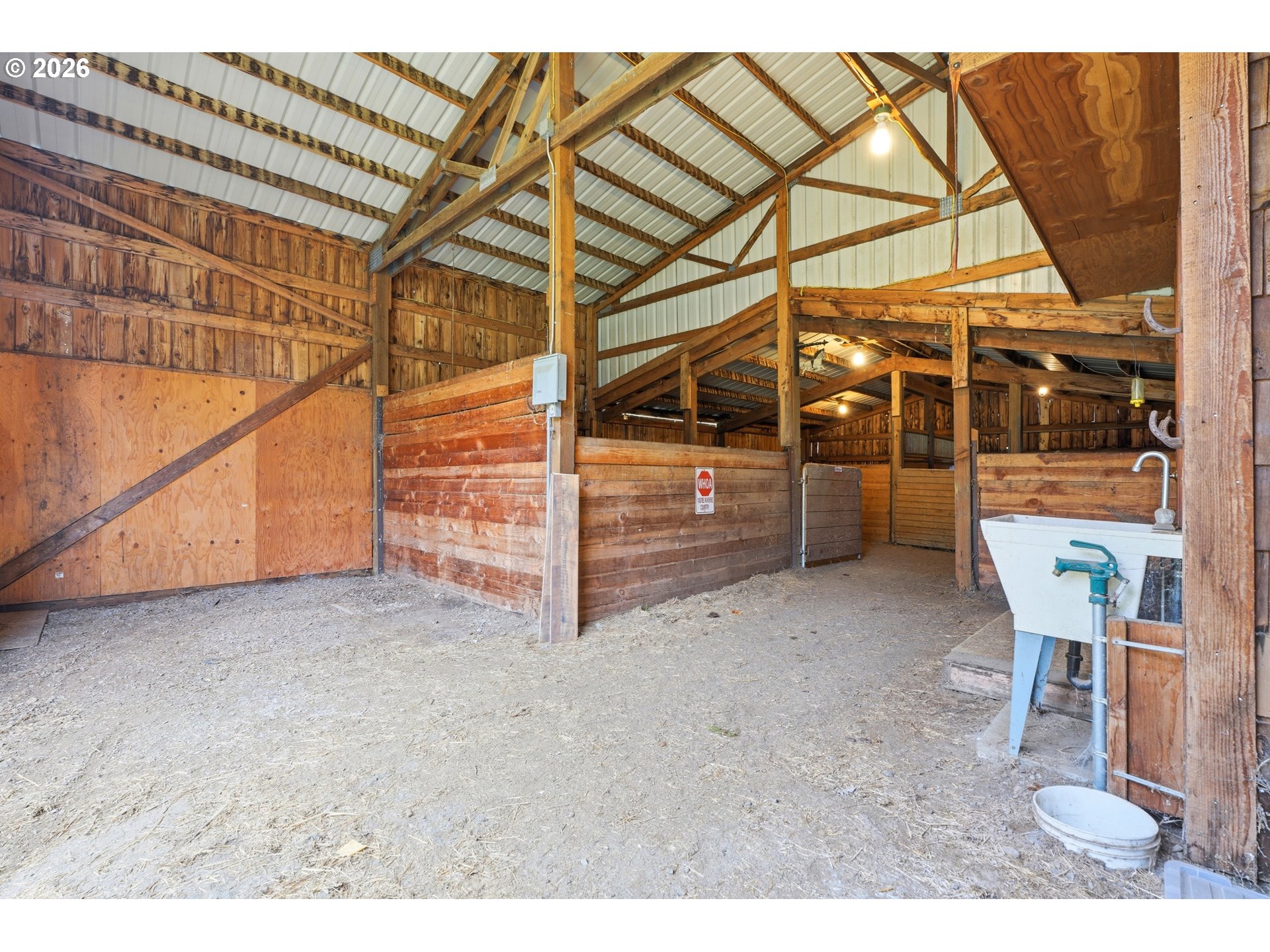29870 South Dhooghe Road Colton, OR 97017 - Photo 41 of 48 a view of a room with racks on the wall
