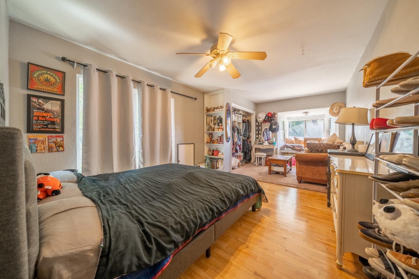 41 Varni Road Watsonville, CA 95076 - Photo 18 of 59 a bedroom with a bed furniture and a chandelier