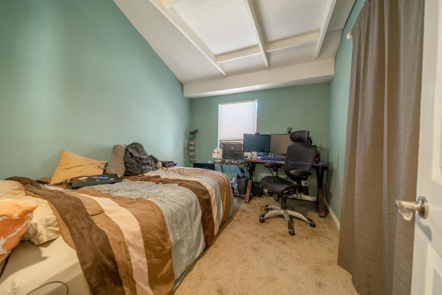 41 Varni Road Watsonville, CA 95076 - Photo 44 of 59 a bed room with a bed and a chair