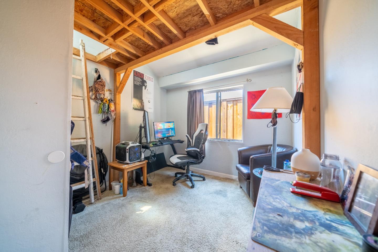 41 Varni Road Watsonville, CA 95076 - Photo 46 of 59 a reading room with furniture and a rug