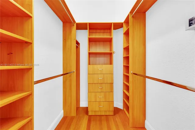 a view of balcony with wooden floor