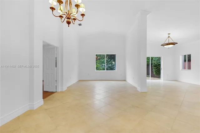 a view of a white house with a window