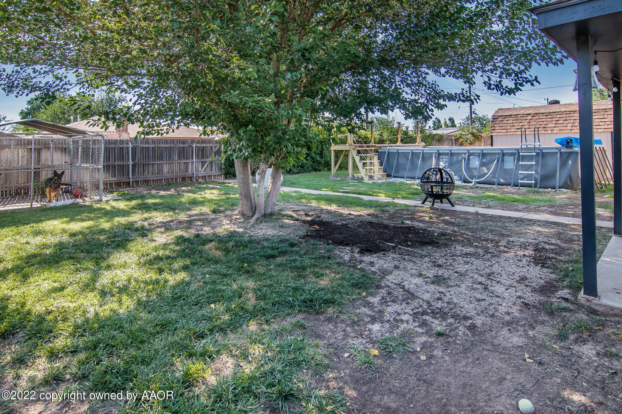 8101 Leah Trail Amarillo, TX 79110 - Photo 17 of 18 a backyard of a house with lots of green space