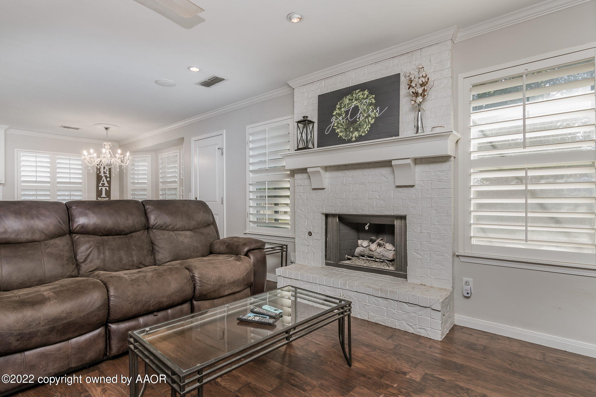 8101 Leah Trail Amarillo, TX 79110 - Photo 4 of 18 a living room with furniture a fireplace and window