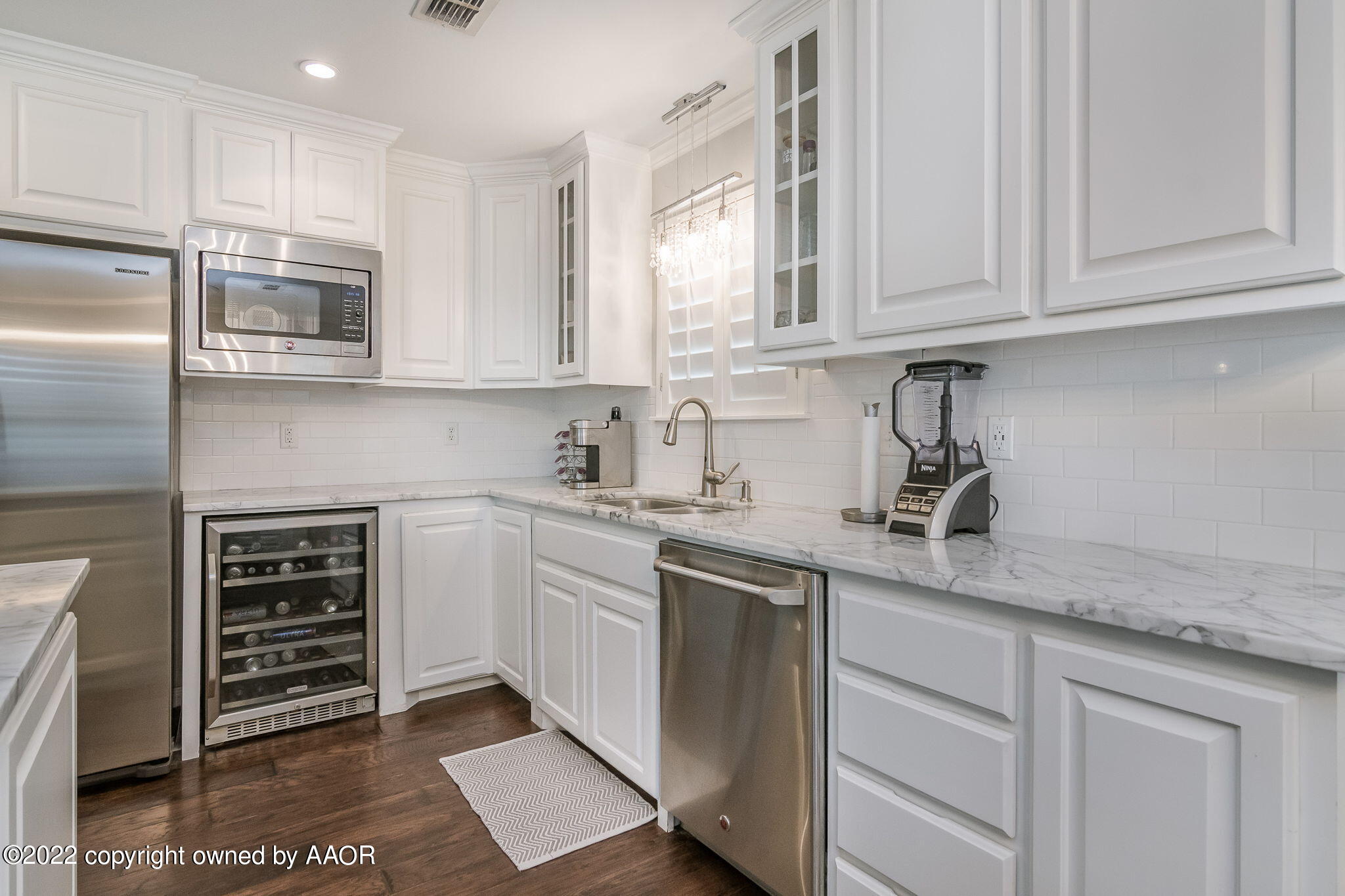 8101 Leah Trail Amarillo, TX 79110 - Photo 7 of 18 a kitchen with stainless steel appliances granite countertop a sink and cabinets