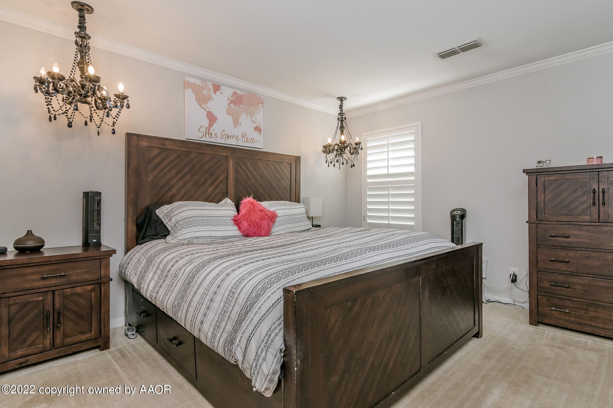 8101 Leah Trail Amarillo, TX 79110 - Photo 10 of 18 a bedroom with bed and dresser