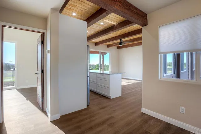 a view of a room with a sink and a window