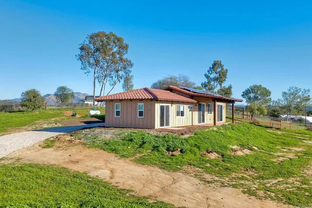 a house view with a garden space