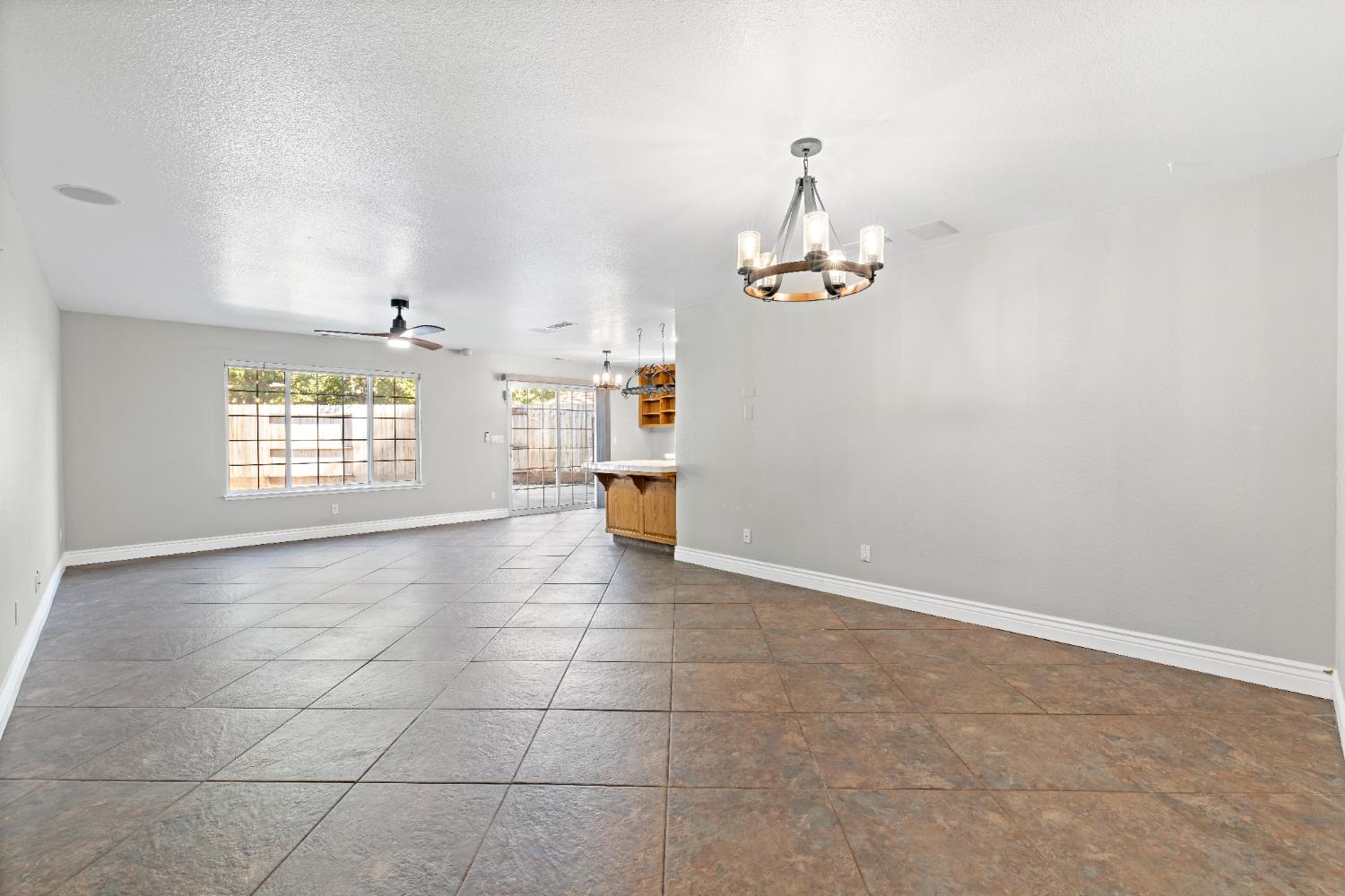 2903 Raintree Court Stockton, CA 95219 - Photo 9 of 34 a view of an empty room with a window