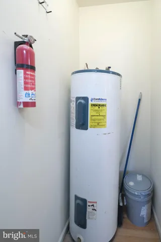 a front view of a residential apartment building with a yard