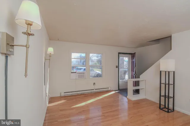 a kitchen with a sink and a window