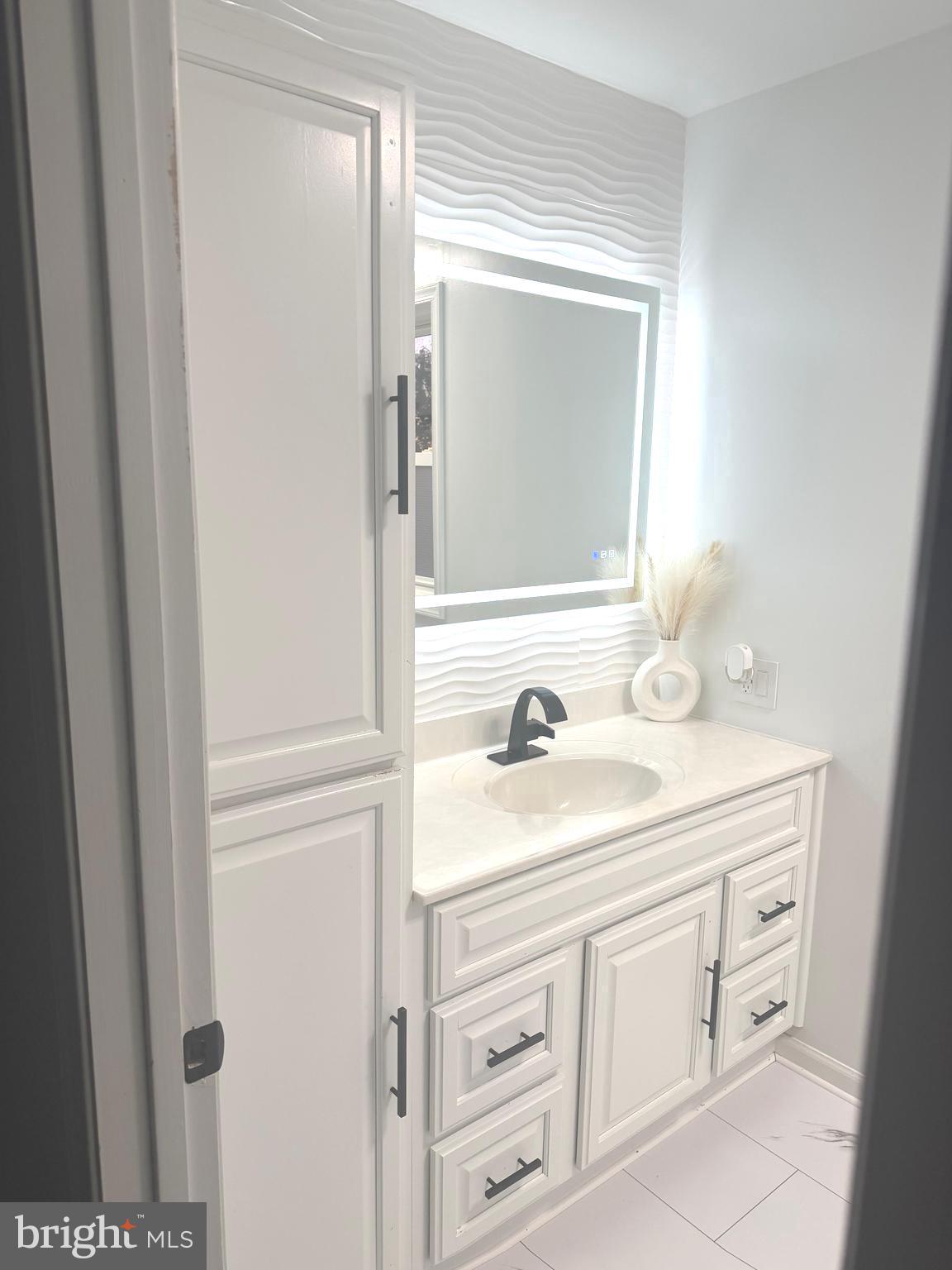 71 Apricot Avenue Leola, PA 17540 - Photo 17 of 30 a bathroom with a sink and a mirror