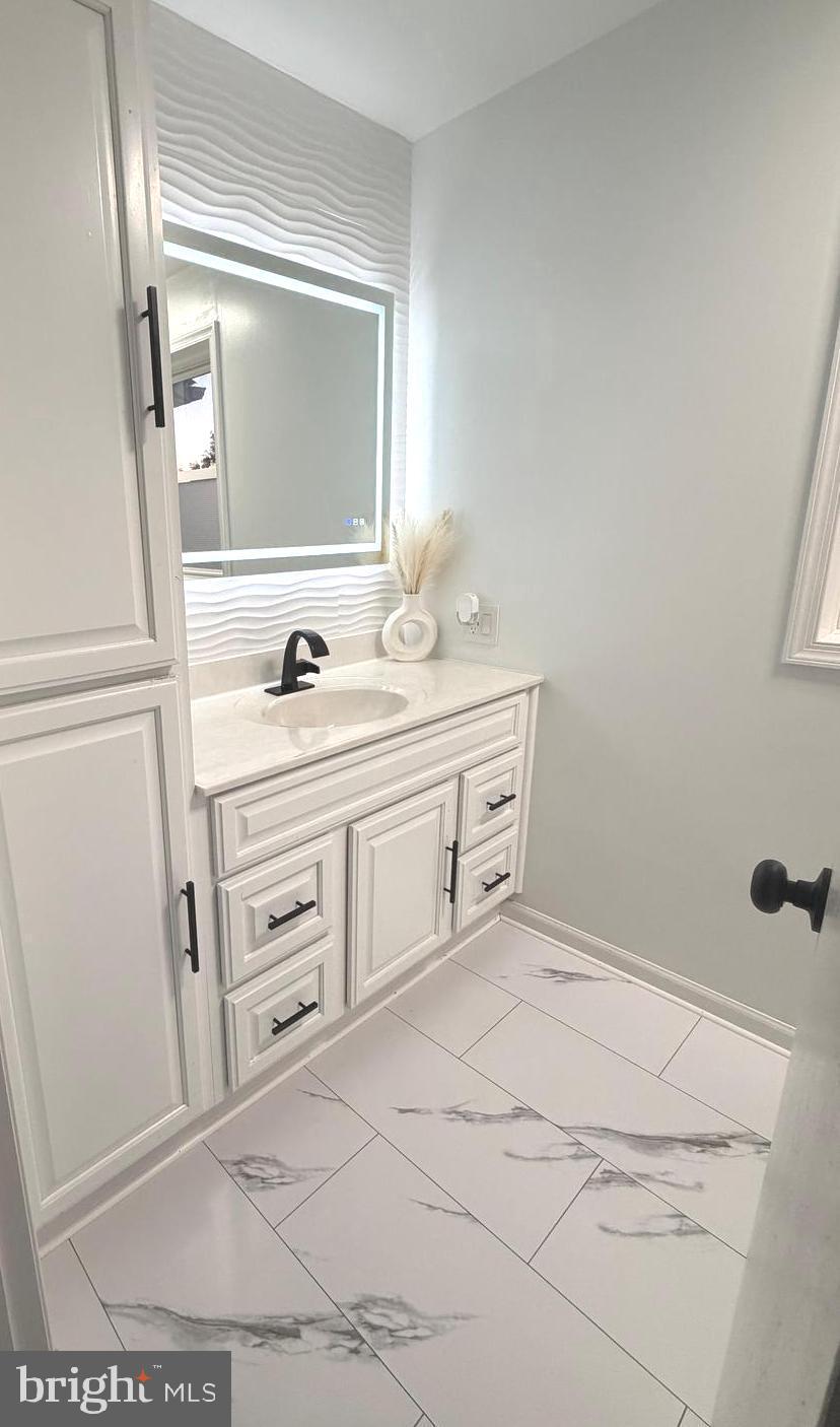 71 Apricot Avenue Leola, PA 17540 - Photo 18 of 30 a bathroom with a sink vanity and mirror