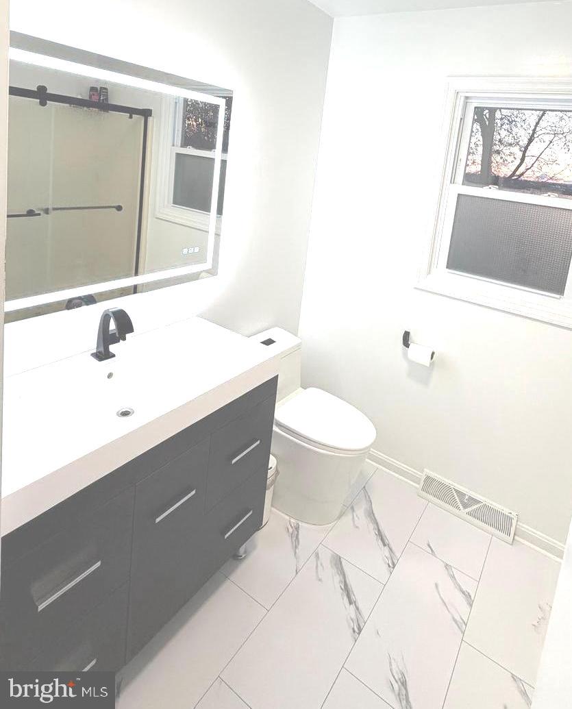 71 Apricot Avenue Leola, PA 17540 - Photo 27 of 30 a bathroom with a sink toilet and mirror